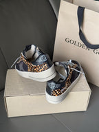 Golden Goose low-top sneakers in navy with leopard-print trim and white outsole