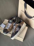 Golden Goose lace-up sneakers, navy with leopard-print trim and white rubber outsole