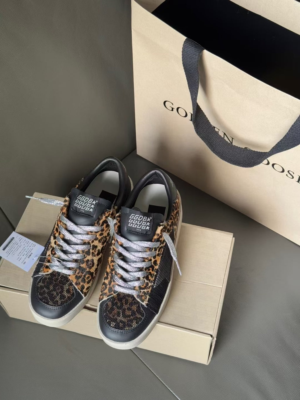 Golden Goose lace-up sneakers in navy with leopard-print toe and stripe detailing
