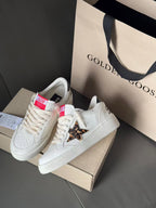 White leather sneakers with leopard patch and star detail