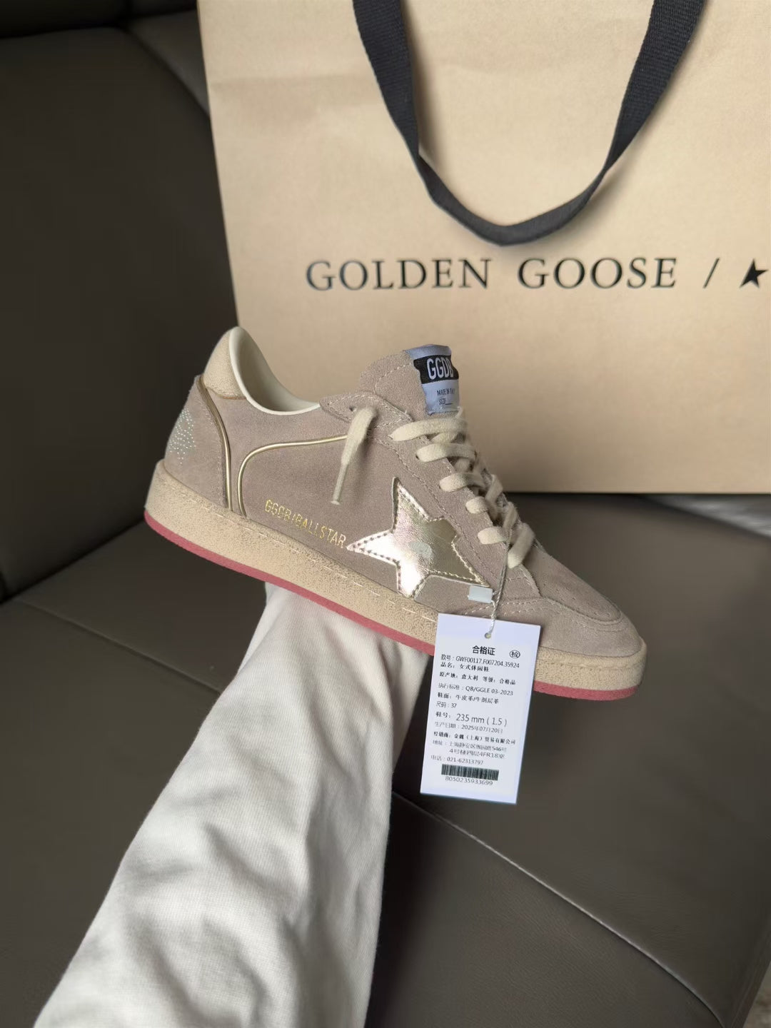 Golden Goose low-top sneakers, light gray suede with pink-red side stripe
