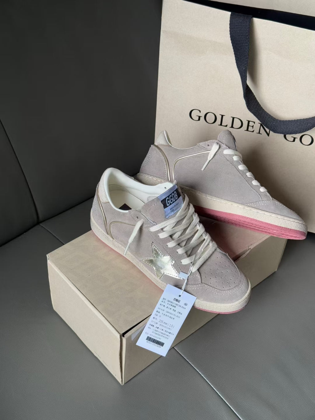 Golden Goose sneakers, light gray suede with white laces and pink-red side stripe