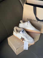 Golden Goose white sneakers with leopard side panel and tan sole, with plush lining