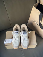 Golden Goose white sneakers with leopard panel, tan sole, plush lining, lace-up style
