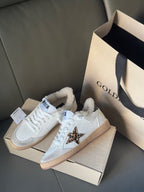 Golden Goose white sneakers with leopard detail on side, tan sole, plush sherpa lining