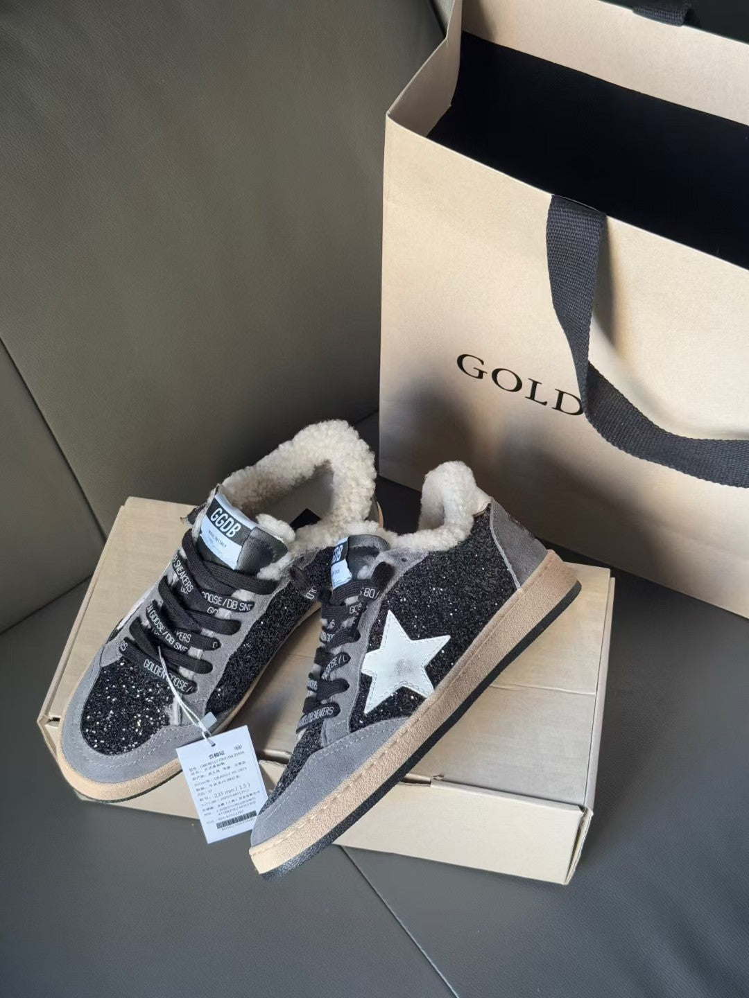 Golden Goose sneakers with glitter navy uppers, white star panels, beige sole, sherpa collar