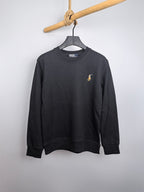Dark charcoal crewneck sweatshirt with small Polo logo on left chest