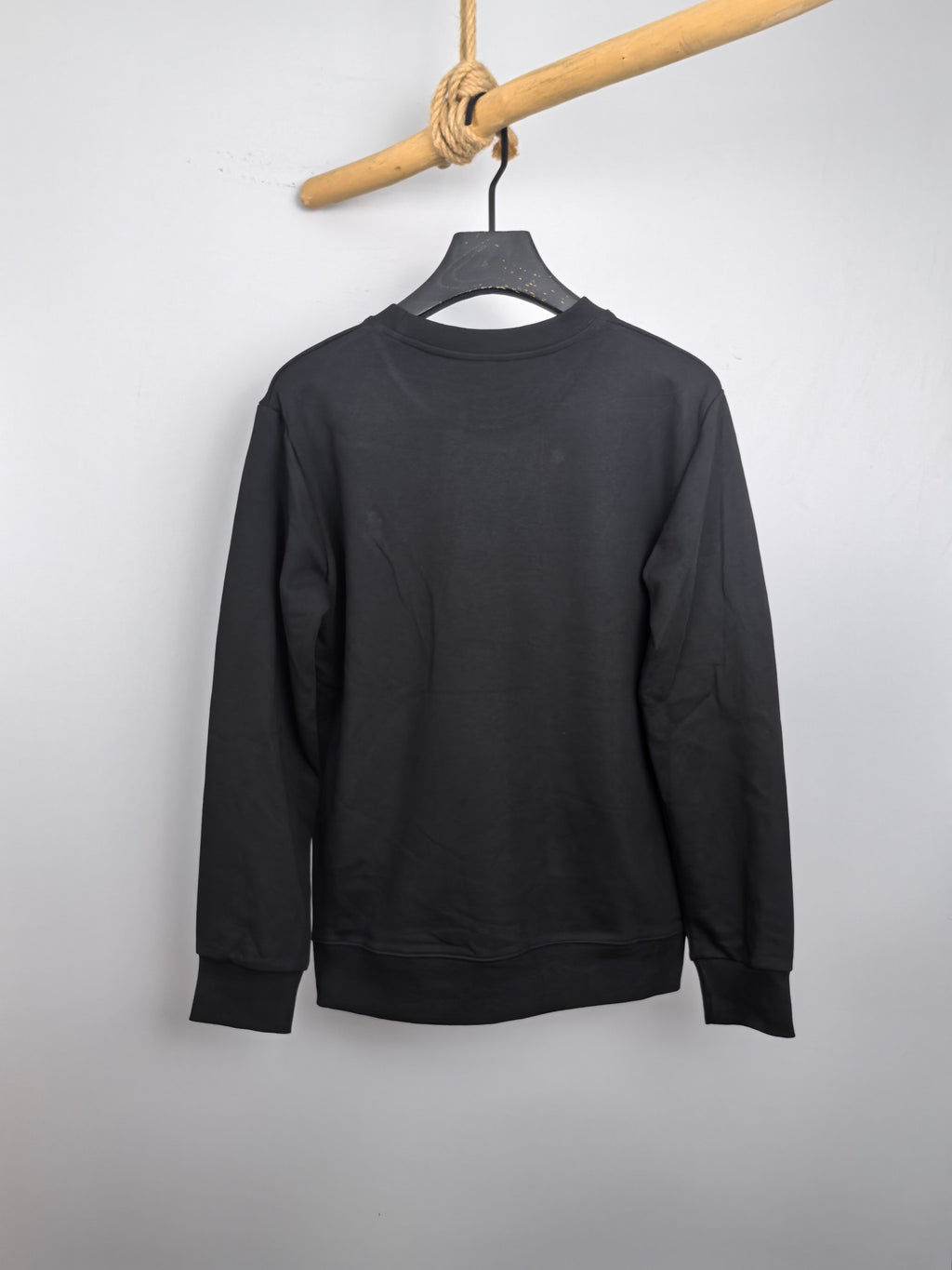 Dark charcoal crewneck sweatshirt, back view