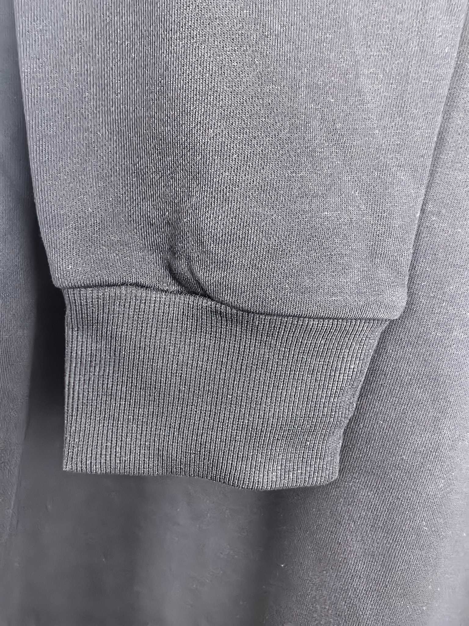 Dark charcoal sweatshirt ribbed sleeve cuff
