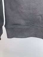 Dark gray crewneck sweatshirt ribbed hem detail