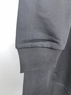 Dark gray crewneck sweatshirt with ribbed cuff and hem