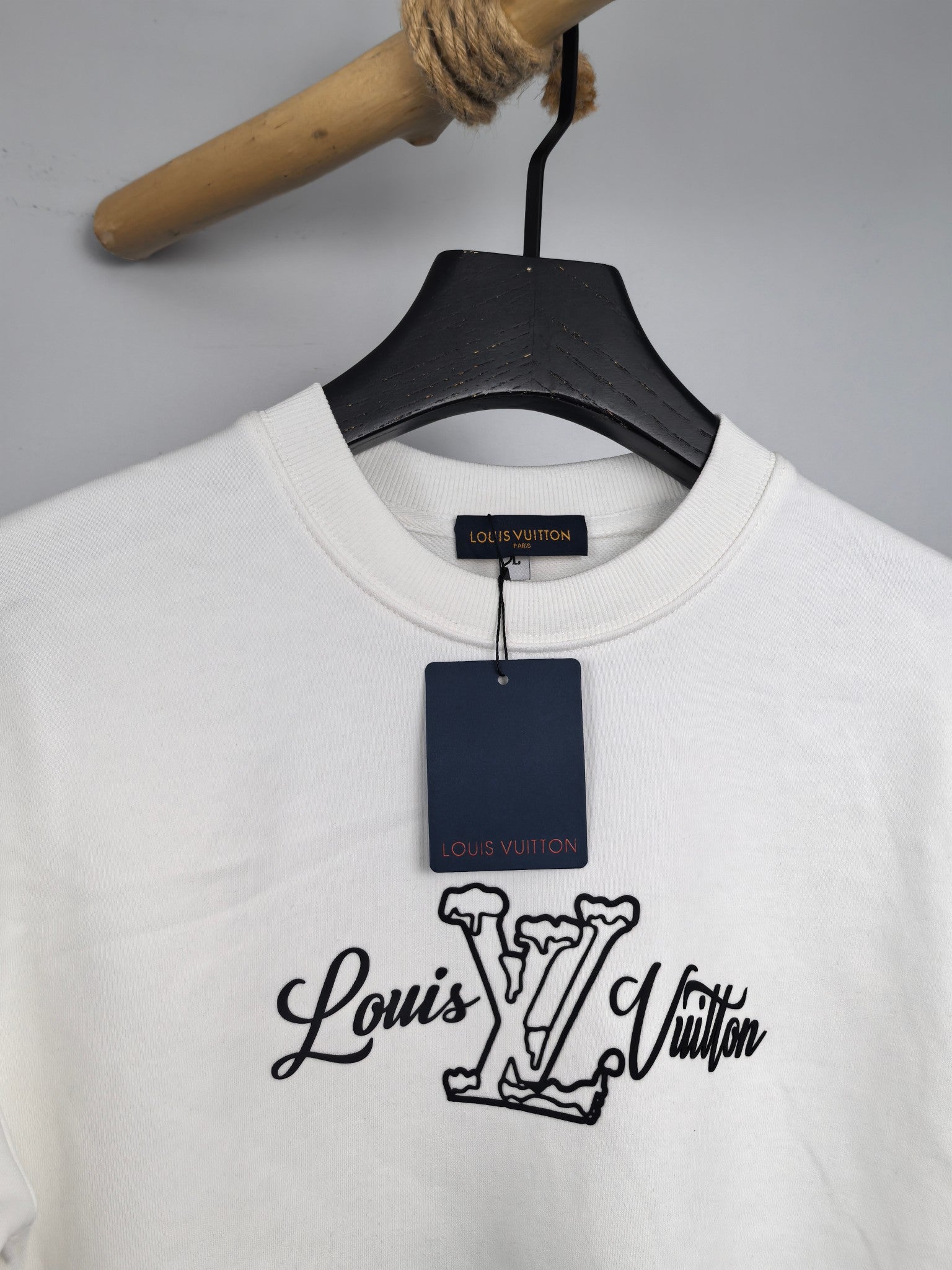 White Louis Vuitton sweatshirt neckline with front logo, hanging tag