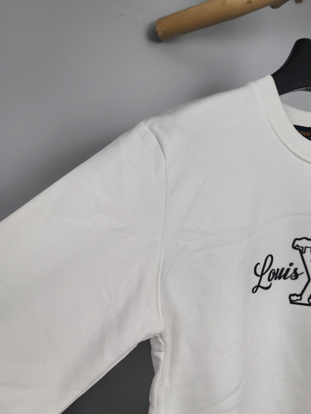 White Louis Vuitton sweatshirt sleeve and small chest logo detail