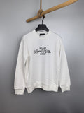 White Louis Vuitton long-sleeve sweatshirt with chest logo graphic
