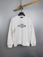 White Louis Vuitton long-sleeve sweatshirt with chest logo graphic