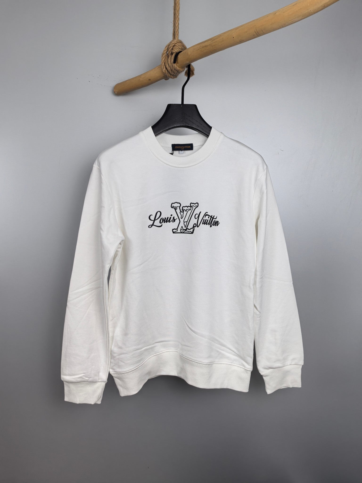 White Louis Vuitton long-sleeve sweatshirt with chest logo graphic
