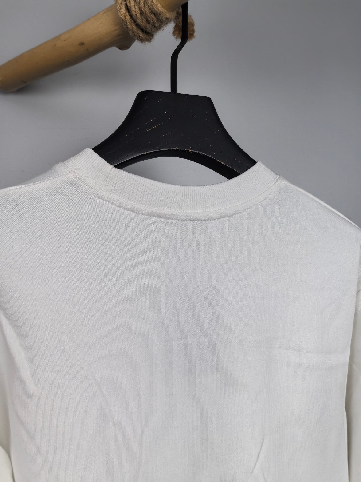 White Louis Vuitton sweatshirt back collar on hanger
