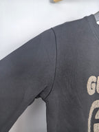 Gucci long-sleeve sweatshirt sleeve with edge of GUCCI graphic