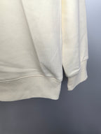 Cream sweatshirt back hem with ribbed waistband and sleeve cuff
