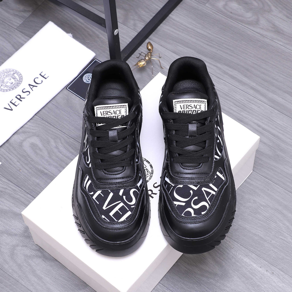 Versace luxury shoes, two black logo lace-up sneakers with thick tread sole