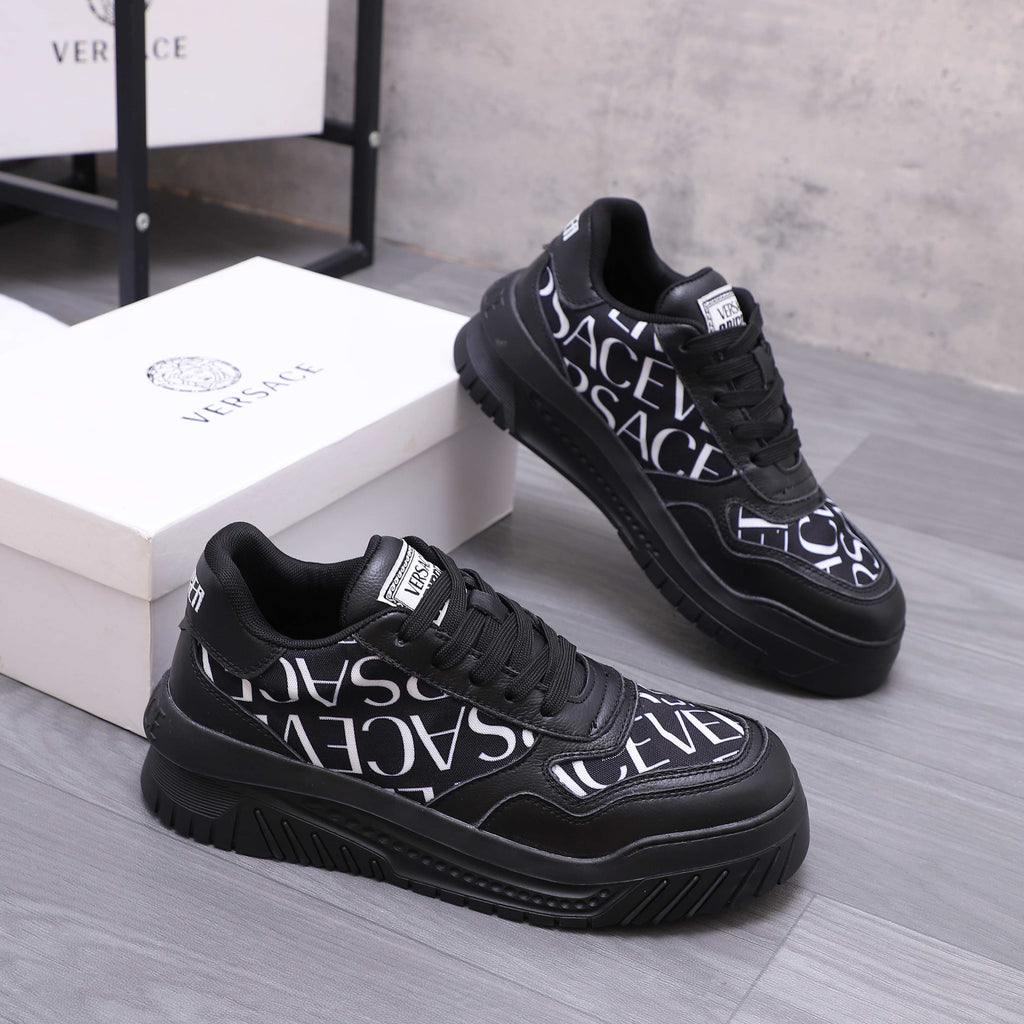 Versace luxury shoes, black logo lace-up sneakers with white script on sides
