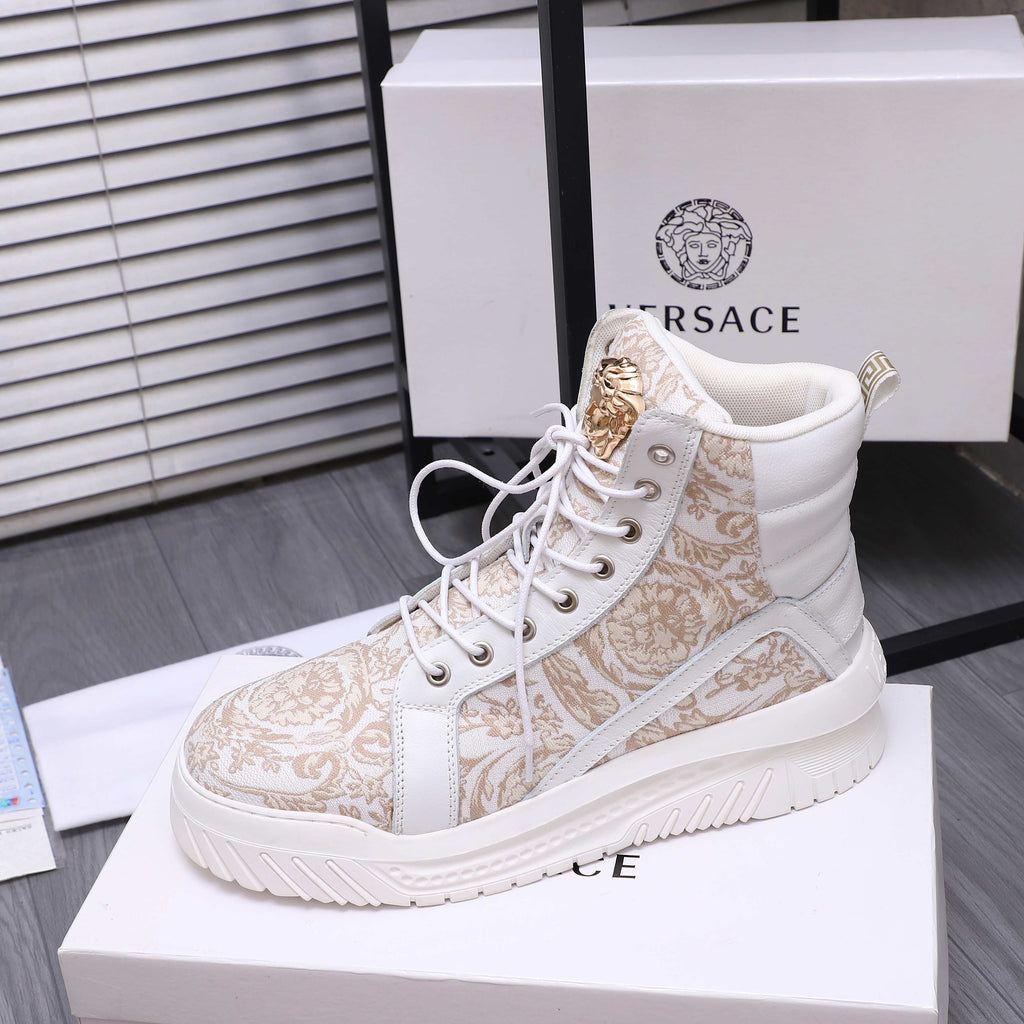 White high-top sneakers with gold pattern stripe and lace-up front