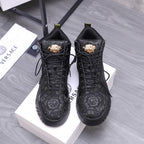 Versace black lace-up high-top sneakers with patterned sides and gold emblem detail