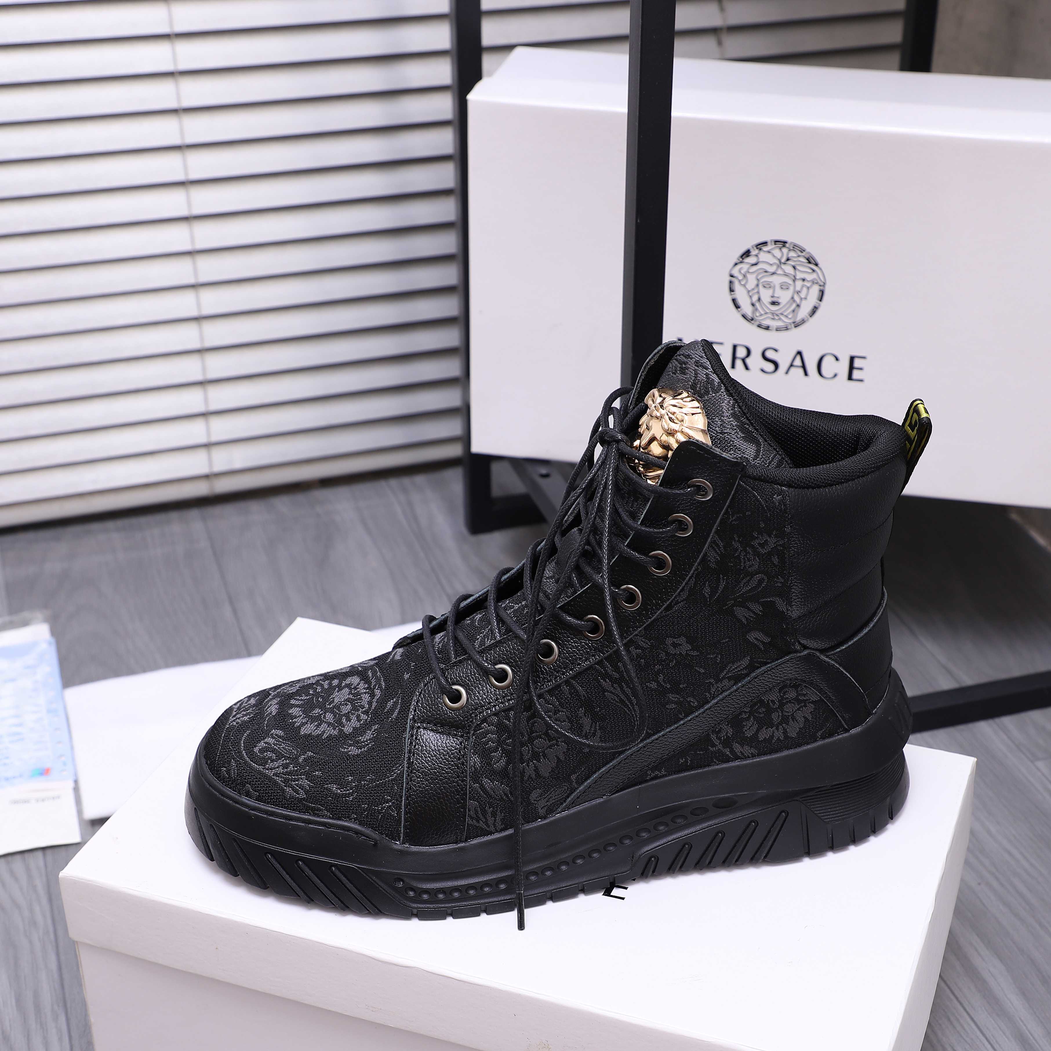 Versace black lace-up high-top sneaker with textured pattern and gold crest on tongue