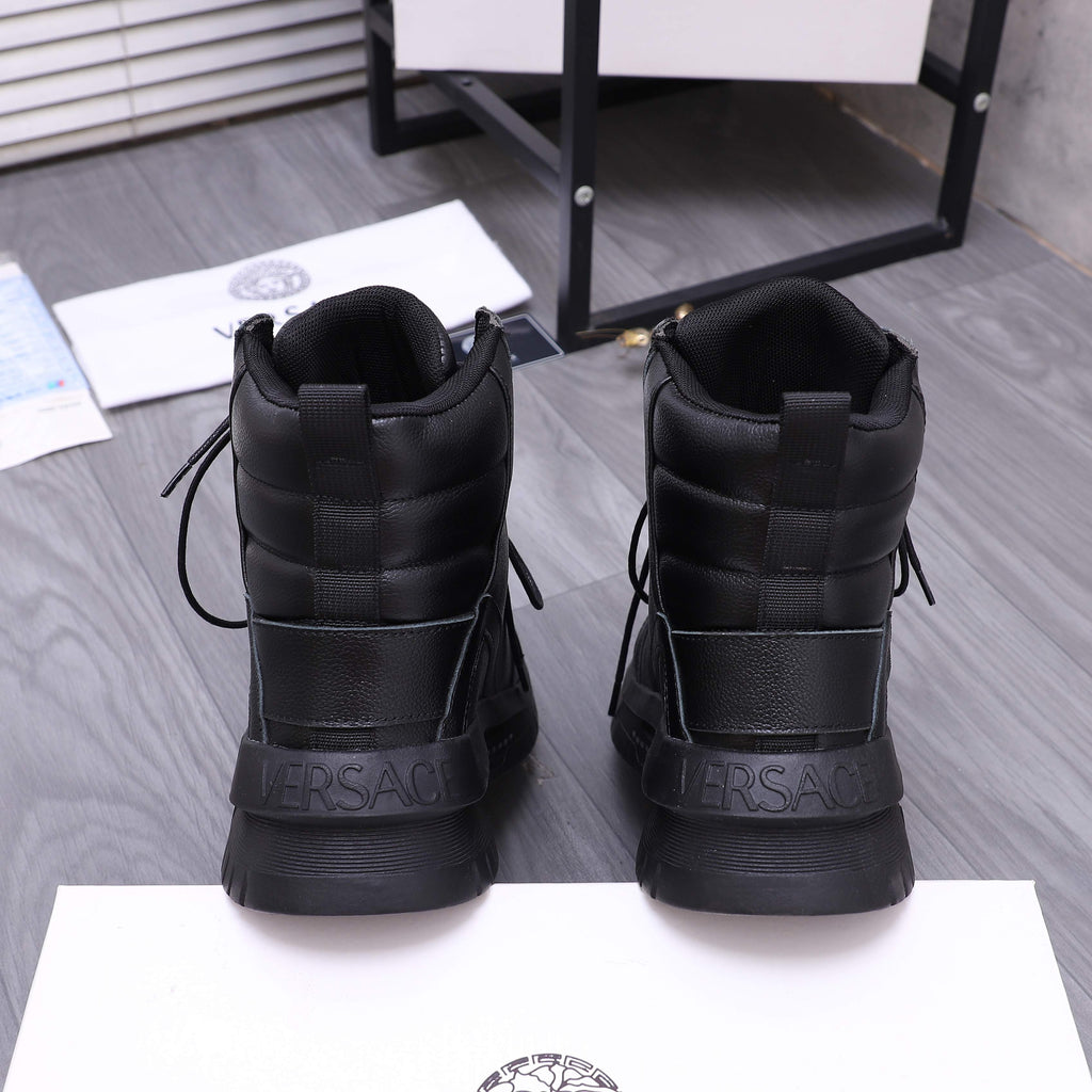 Black lace-up high-top shoes with quilted heel panels and embossed logo on back