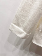 Dior white sleeve hem with ribbed cuff edge and stitched border