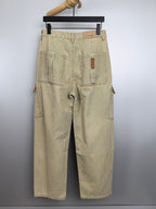 Beige denim cargo pants with back pockets and square logo patch detail