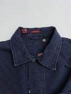 Gucci denim jacket collar with snap buttons and textured dark navy fabric