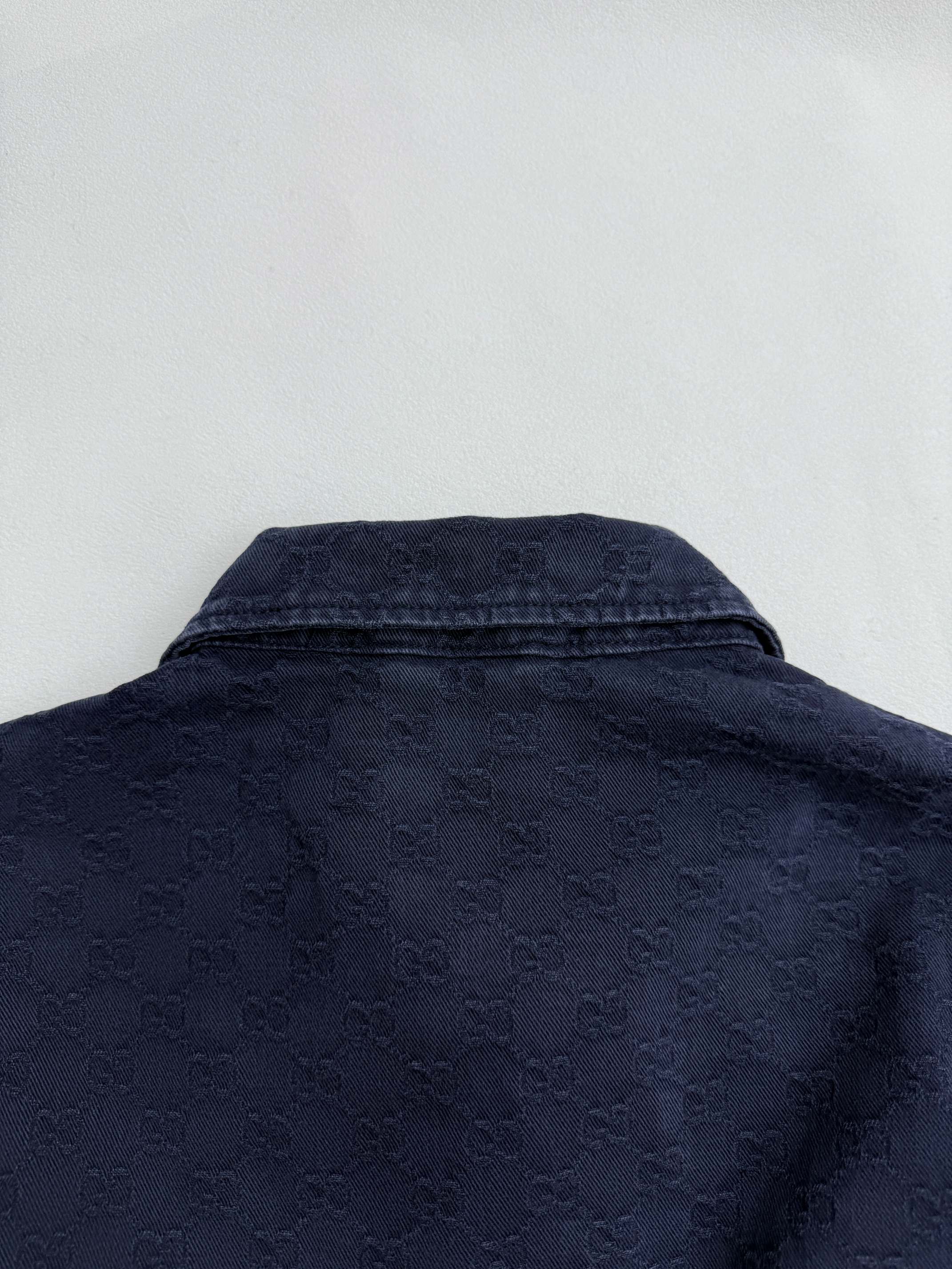 Gucci denim jacket back with high collar and textured dark navy finish