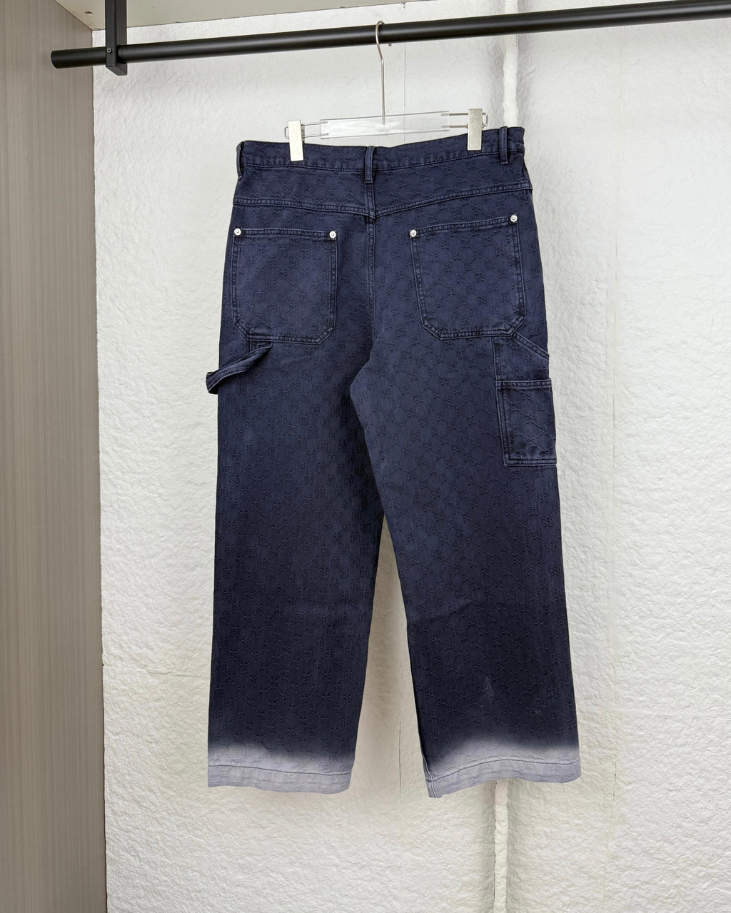 Navy Gucci pants with GG pattern, belt loops, button front, flap side pocket