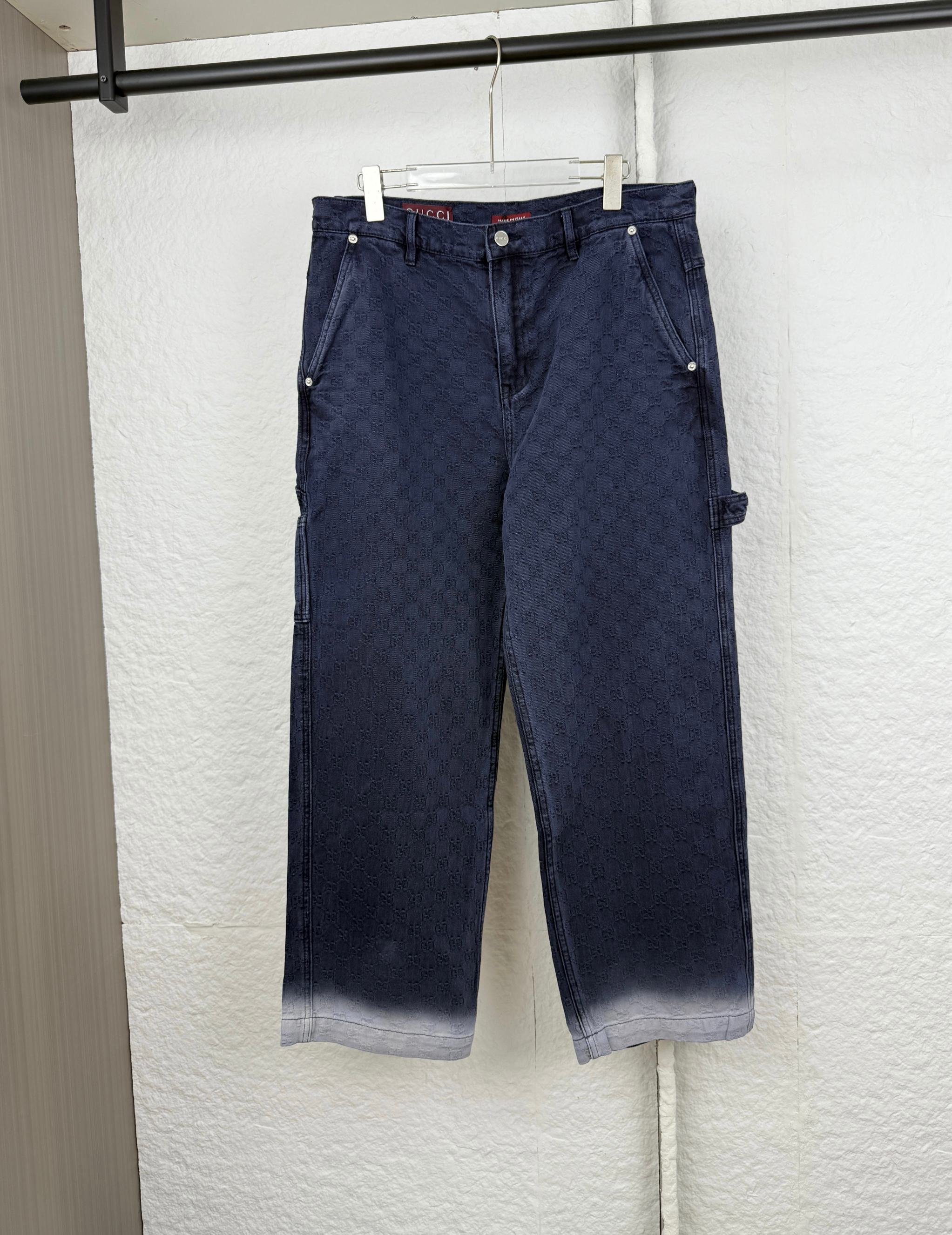 Navy Gucci pants, allover GG logo pattern, front button/zip, straight legs