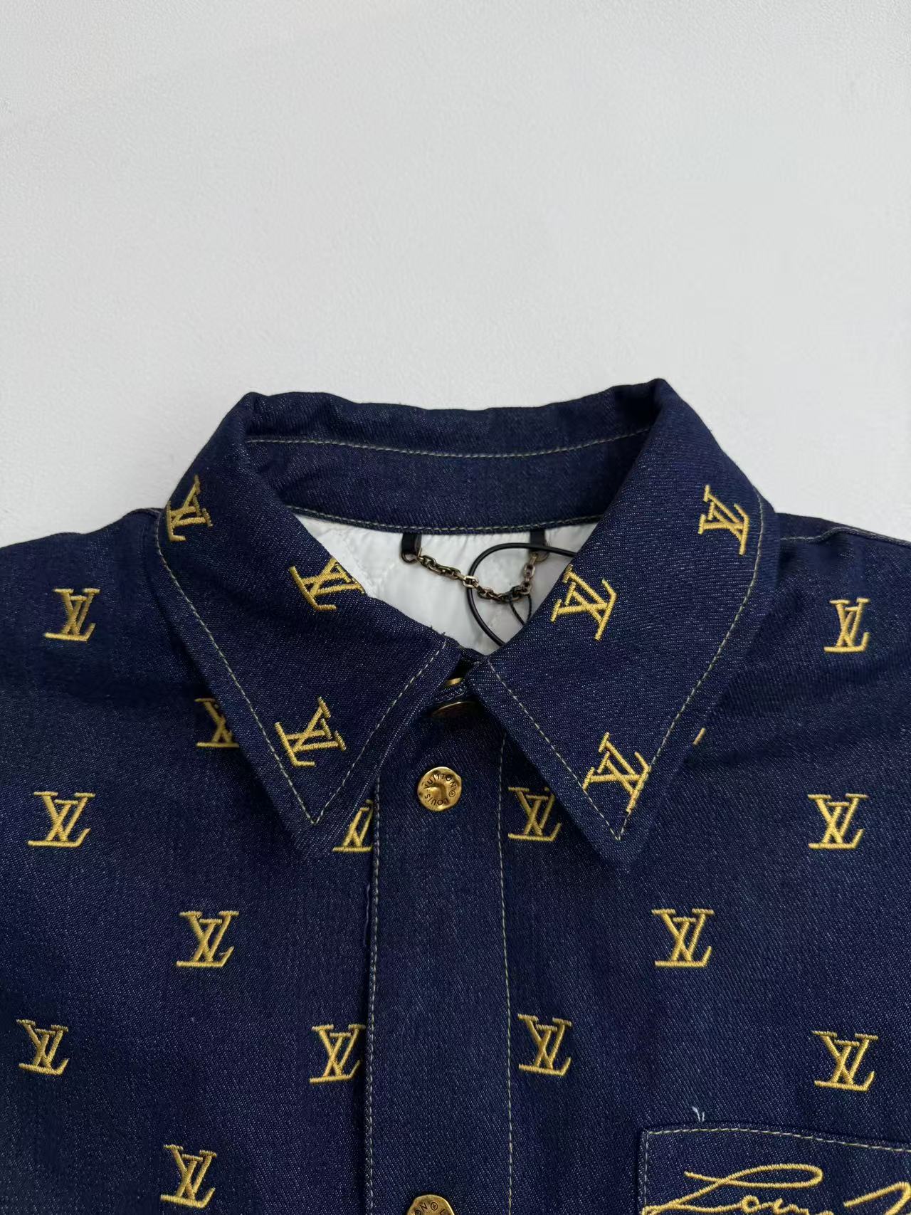 Louis Vuitton denim jacket collar in dark blue with yellow monogram detailing