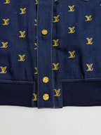 Louis Vuitton denim jacket front placket with gold buttons and yellow monogram