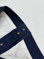 Louis Vuitton denim jacket with quilted white lining at shoulder and rib trim