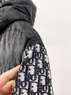 Dior hooded puffer jacket sleeve, black-and-gray logo pattern side
