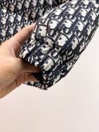 Dior logo-print jacket cuff with elastic hem and black drawcord close-up
