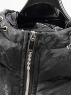 Dior hooded puffer jacket close-up, black zipper and logo-print hood detail