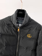 Long puffer jacket hood with front zipper and gold GG logo