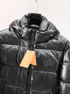 Burberry long puffer jacket, dark shiny black, raised hood with drawcord, front zip.