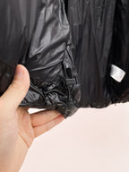 Burberry long puffer jacket, dark shiny black, adjustable hem drawcord and side seams.
