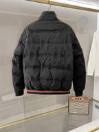 Long puffer jacket with hood, back view, front zipper and ribbed hem detail