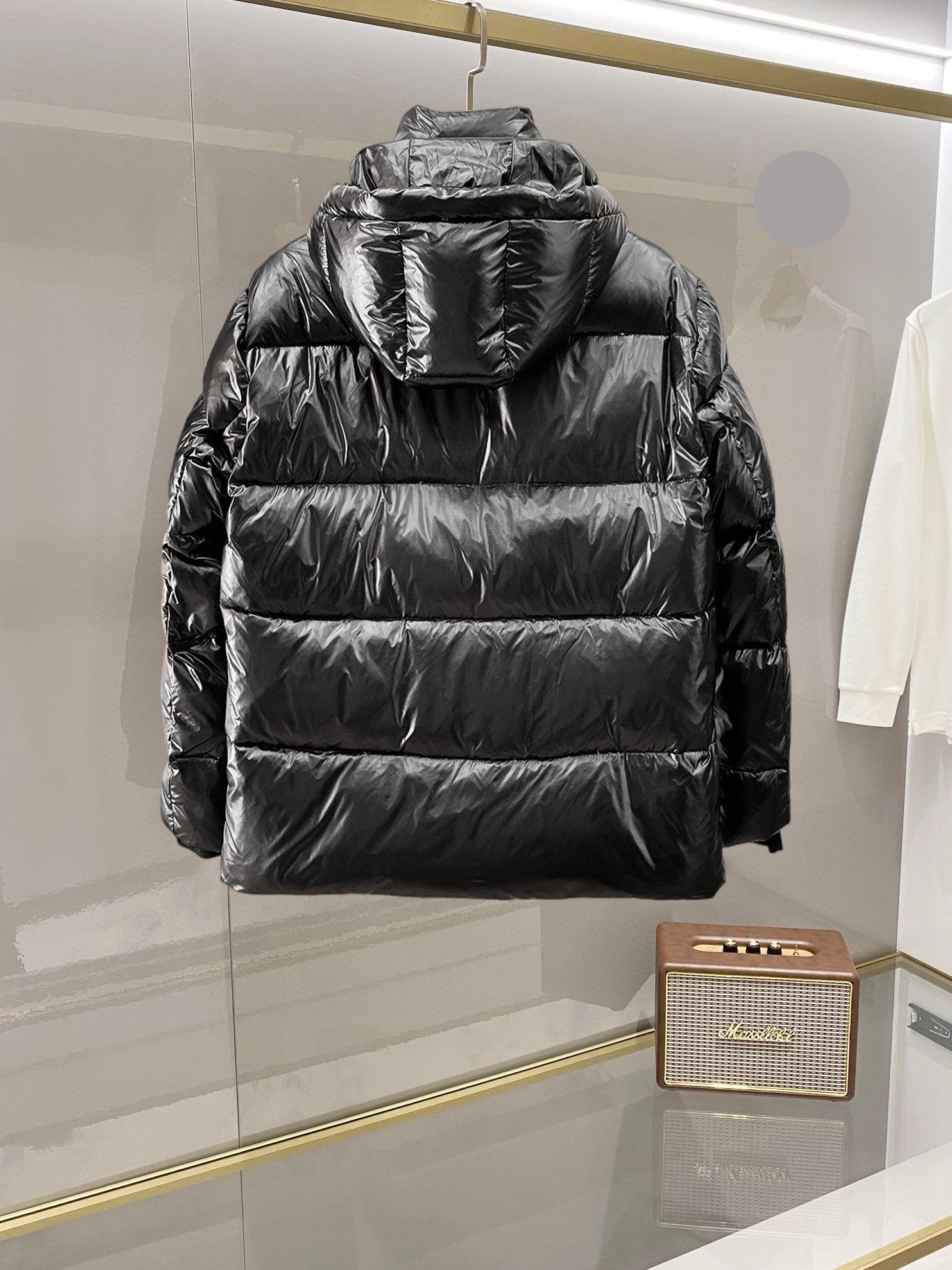 Burberry long puffer jacket, dark shiny black, box-quilted panels, full front zip, hood.