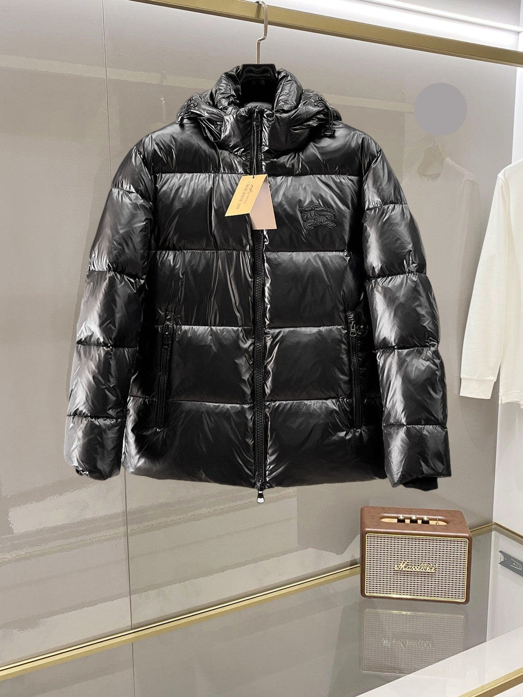Burberry long puffer jacket, dark shiny black, full front zip, stand collar, hoodless.