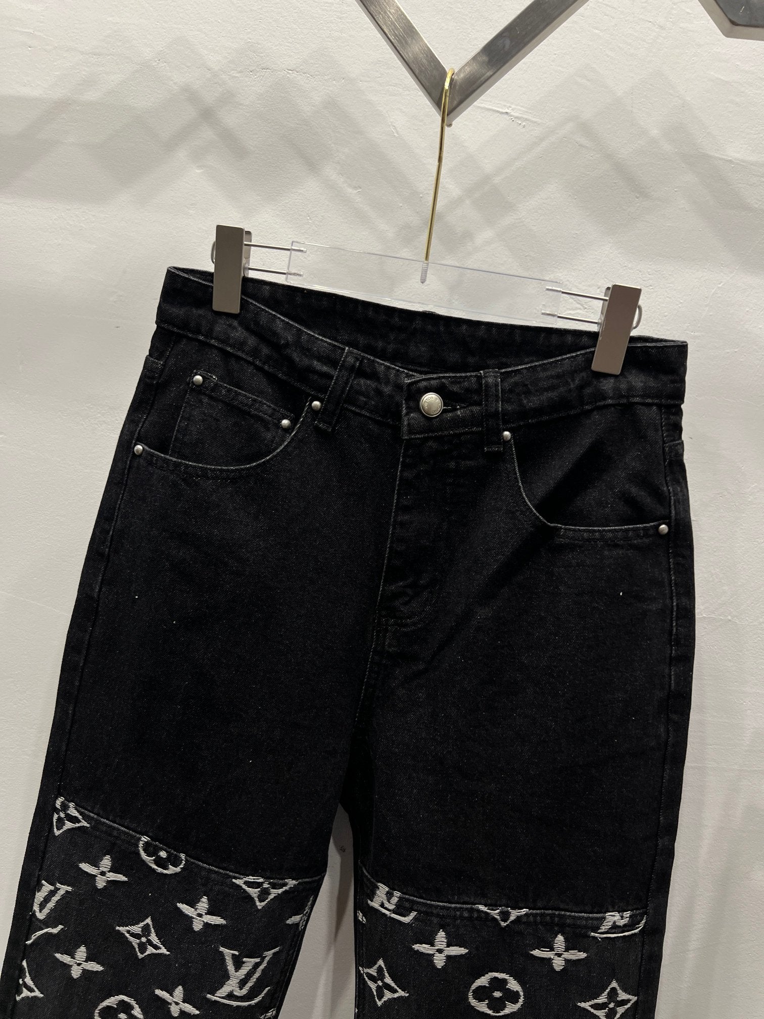 Black denim pants with LV monogram print band on the lower leg