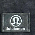 lululemon brand label on dark sweatshirt fabric