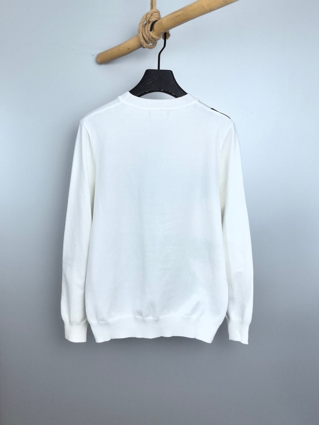 White long-sleeve crewneck sweater, plain back view